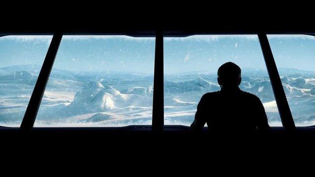 Man Looks Out From Arctic Base