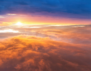 Beautiful sunset above clouds
