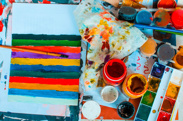 Workplace. Banks with colorful paint brush to paint