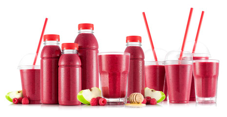 Smoothie in many kinds of glasses and bottles made from apple, raspberry and honey - obrazy, fototapety, plakaty