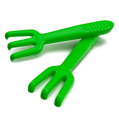 Green toy rake on white 3D Illustration