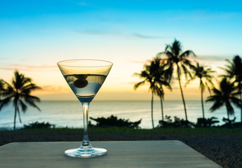 Martini in a beautiful beach setting.

