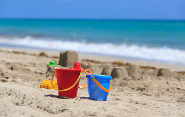 Fototapeta na wymiar kids play on sand beach concept