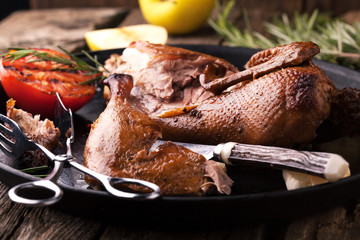 Roast duck with apples and rosemary