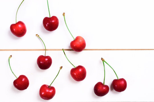 Fresh cherries on wooden table