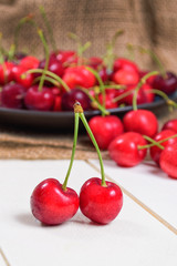 Fresh cherries on wooden table