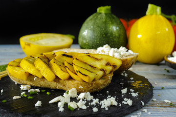 Making of healthy Vegetarian Veggie Sandwich with  Grilled yellow zucchini