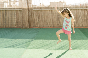 girl playing on the terrace