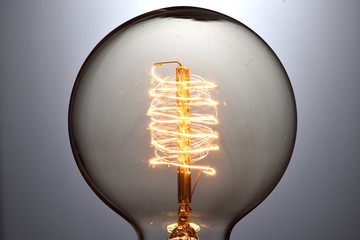 Close up vintage glowing light bulb