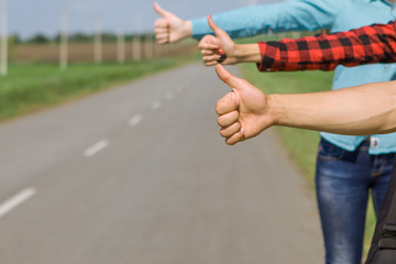 Young hipster friends travel on road