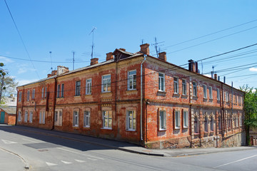 Fototapeta na wymiar Old red brick building