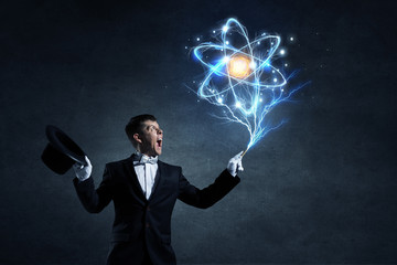 Man magician with cylinder hat