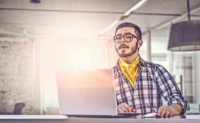 Hipster guy use laptop