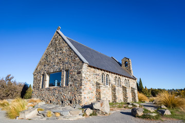 Fototapeta na wymiar Church of Good Shepherd with clear blue sky, New Zealand