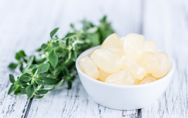 Menthol Candies on wooden background