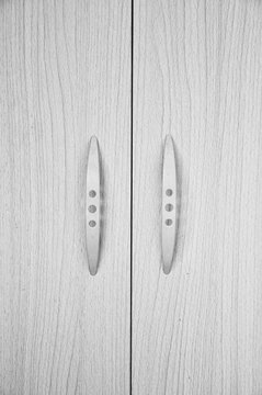 Wooden doors of locker, silver color tone.
