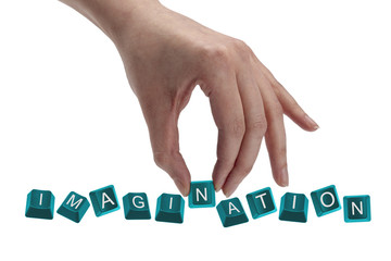 keys spelling the word imagination