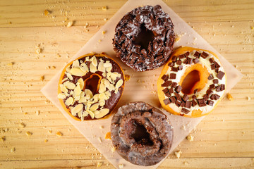 Donuts on wooden background