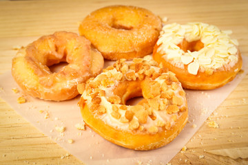 Donuts on wooden background