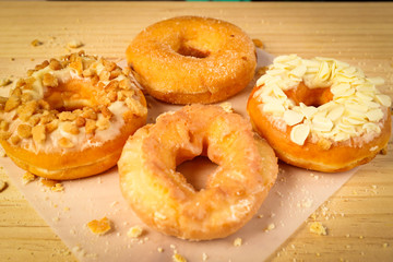 Donuts on wooden background