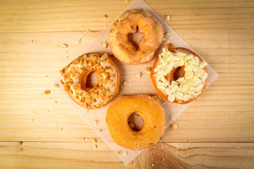 Donuts on wooden background