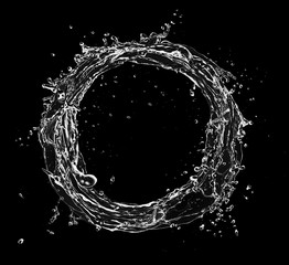 Water splash circle isolated on black background