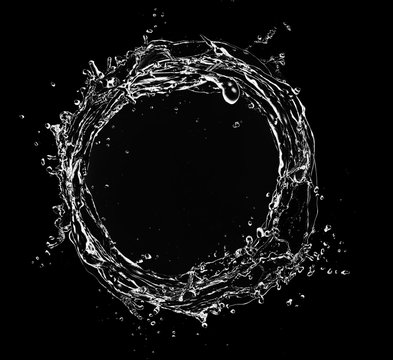 Water splash circle isolated on black background