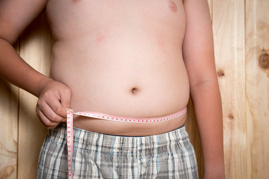 Fat boy, The size of stomach of children with overweight.