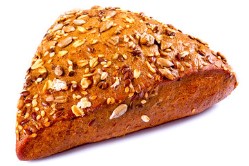 organic rye bun on a white background, close-up
