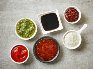 Obraz na płótnie Canvas bowls of various sauces