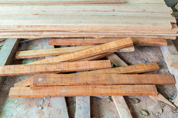 Pile of sawn timber on the ground