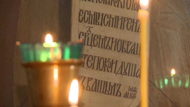 Church candles on the background of prayer,an Orthodox Church.