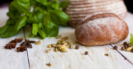 Obraz na płótnie Canvas Bread and basil on the table