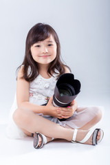 little girl with  camera