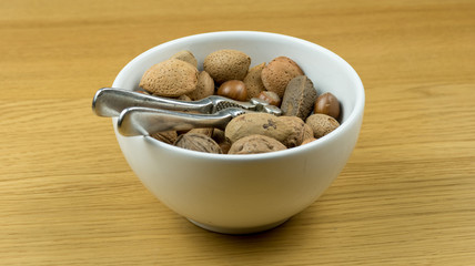 Bowl of nuts with nutcracker