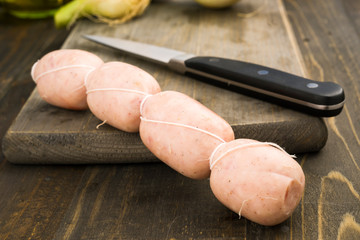 Spanish raw sausages on rustic wooden