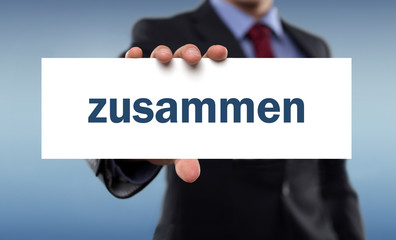 zusammen