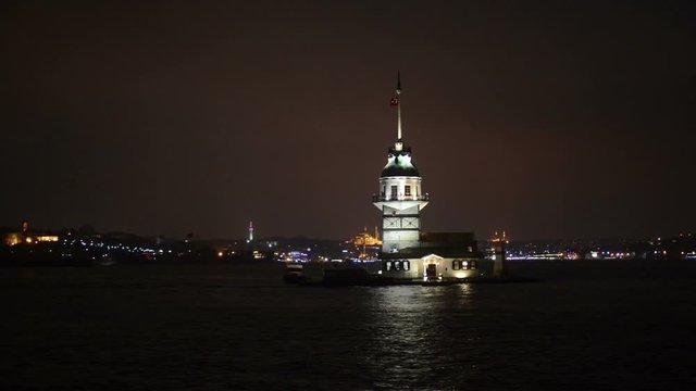 Maiden's Tower or Kız Kulesi in Turkish, also known as Leander's Tower (Tower of Leandros in the Bosphorus in Turkey at night. Cinemagraph clip.