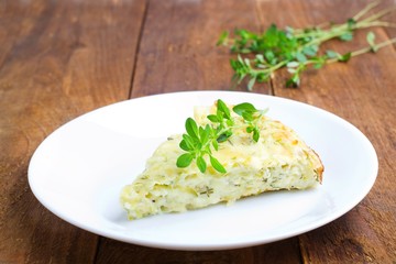 piece casserole with vegetables on a plate,selective focus