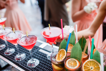 Colorful cocktails close up. an open-air party. after the rain
