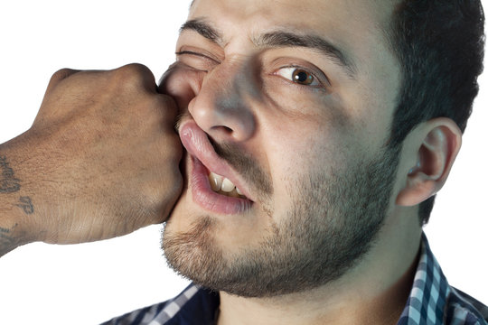 Guy Face Receiving A Punch