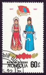 Women in national costumes.Soviet-Mongolian diplomatic relations, 50th anniversary.Postage stamp...