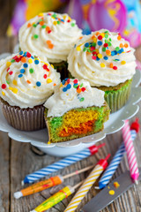 Cupcakes and candles for the holiday cake.