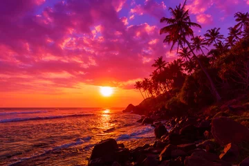 Fototapeten Sonnenuntergang am tropischen Strand mit Palmen-Silhouetten © nevodka.com