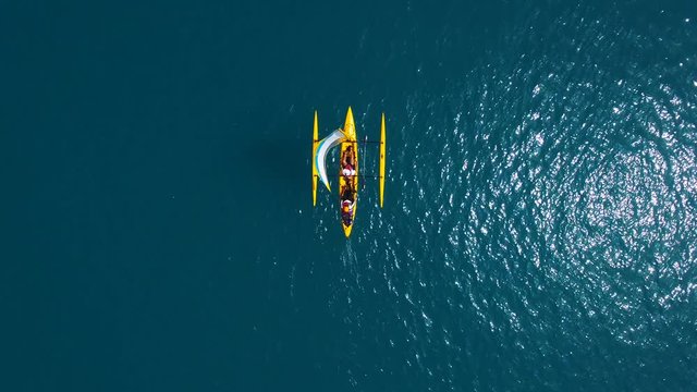 Aerial footage - Catamaran powered by Paddles and wind at sea
