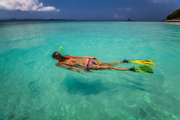 Lady with snorkel and fins