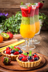 Smoothies with fresh fruit. Strawberries, apricots, kiwi.