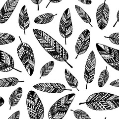 Vector graphic seamless pattern from silhouette leaves hand-drawn in a doodle zentangle style. Trace ink drawing of a black tree leaf texture isolated on white. For wrapping paper, fabric, textile.