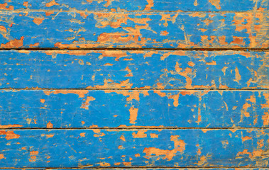 Fototapeta na wymiar old colored paint on the wooden floor