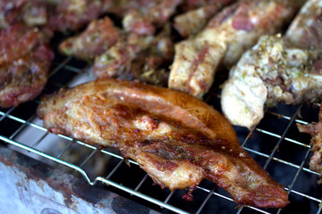 Pork chops being barbecued